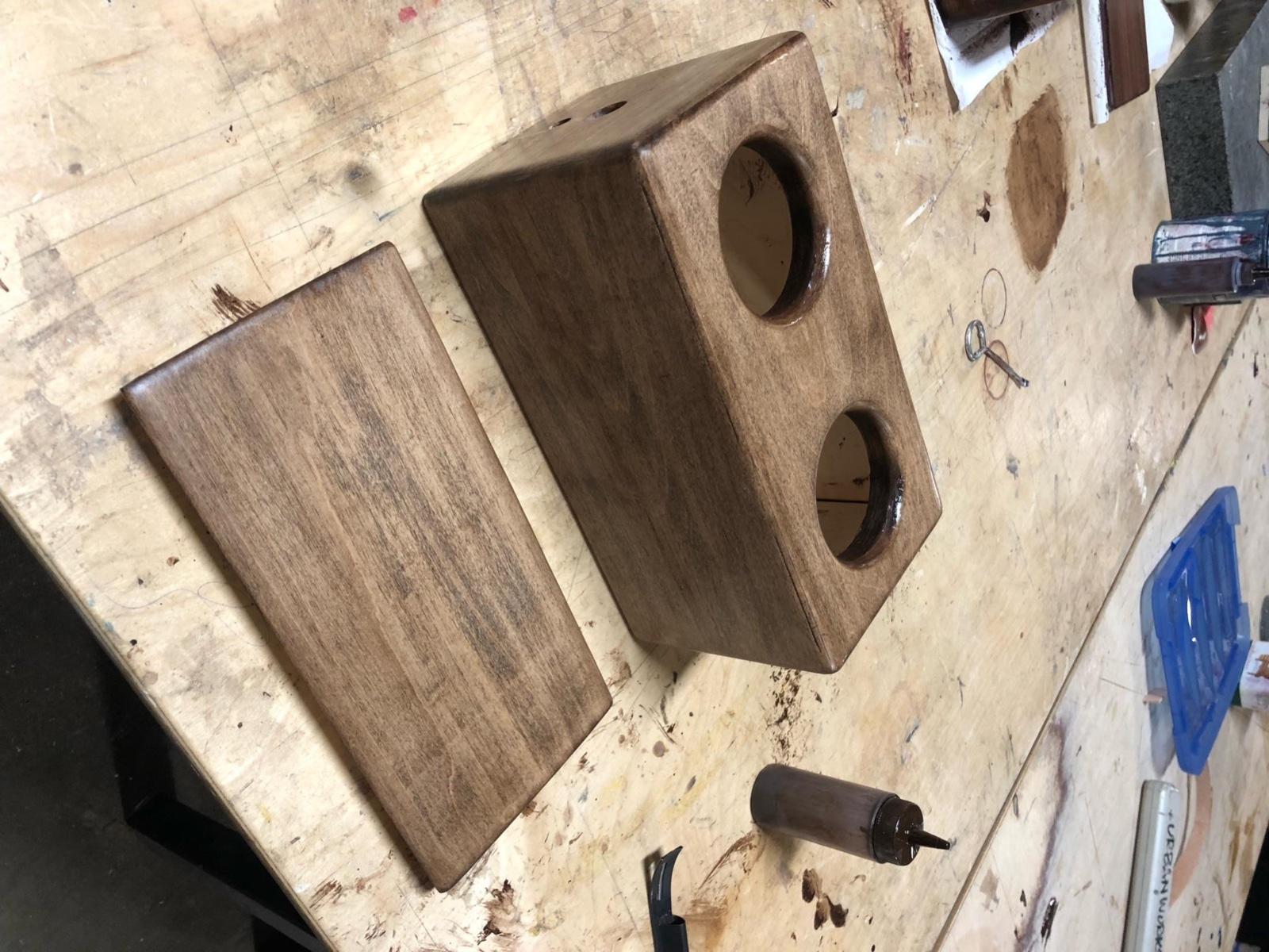 Fig. 3 · The glued cabinet and its removable rear panel after three coats of stain.